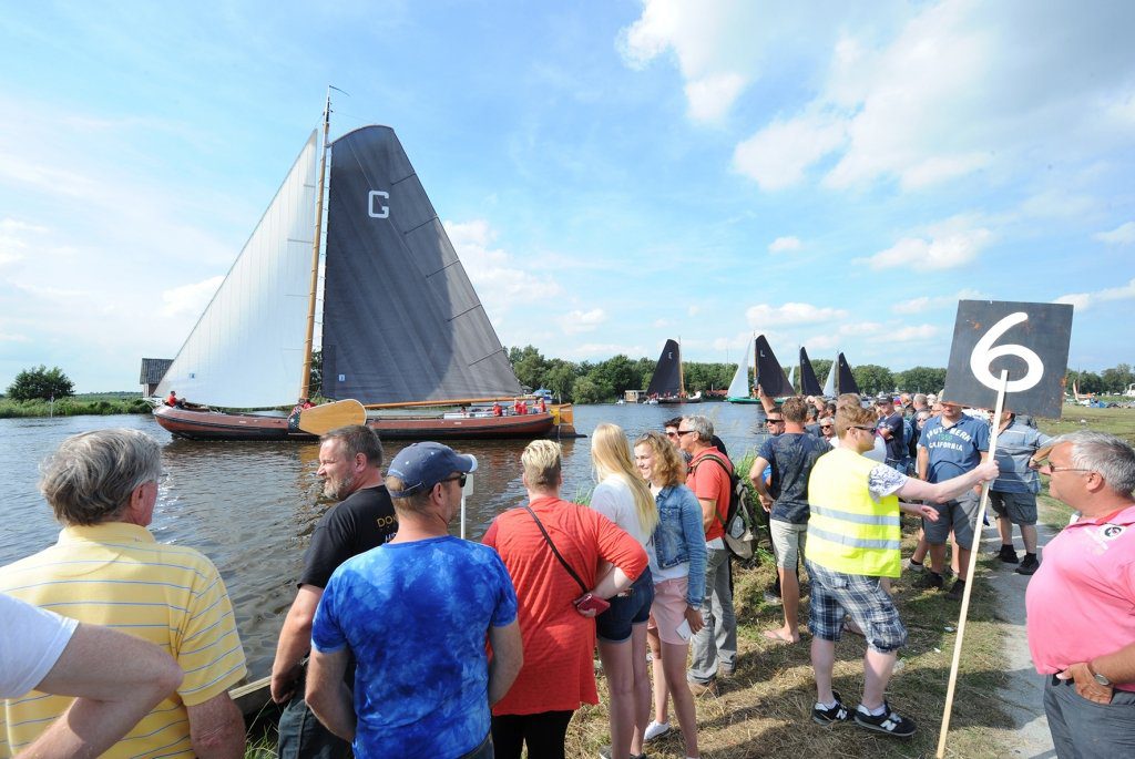 Publiek aanschouwt de finish op nummer in het Grytmansrak